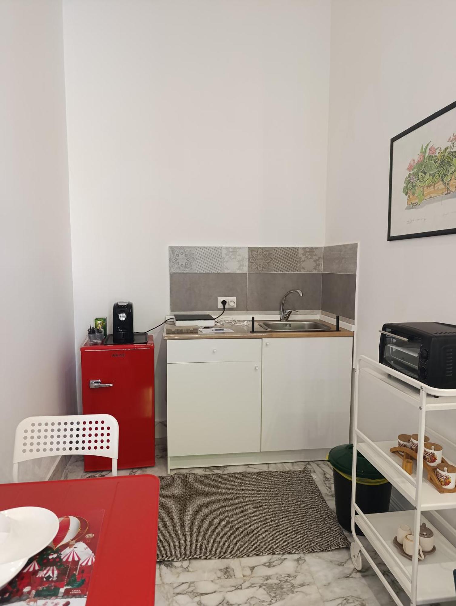 Don Camillo Suites Riposto Værelse billede